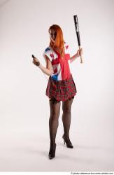 Tina STANDINGPOSE WITH DAGGER AND BASEBALL BAT 